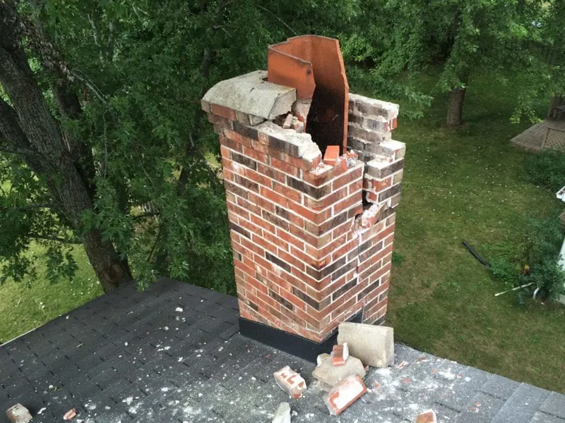 Masonry stack rebuilt above the roofline