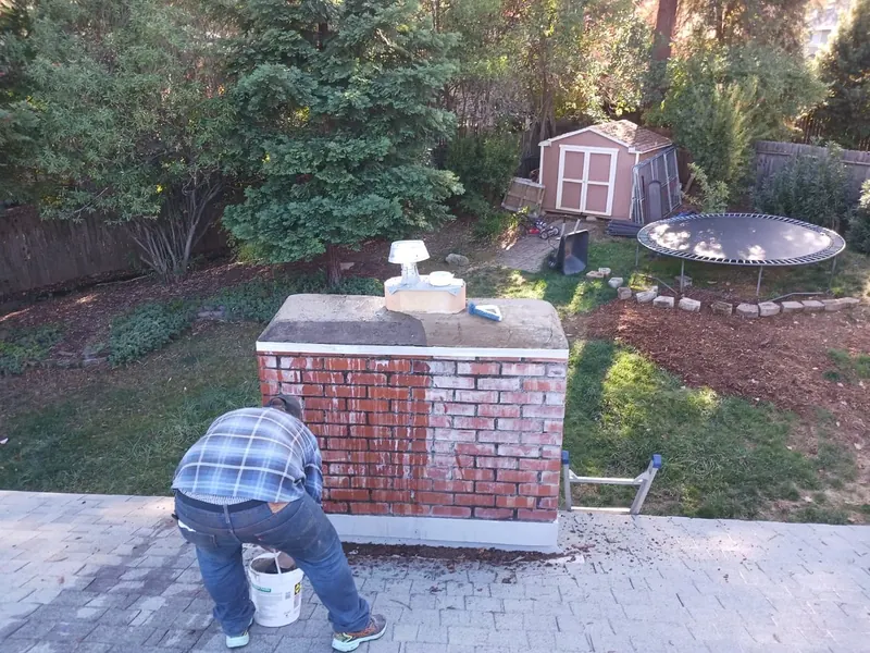 Brick chimney repointed and finished with a new stainless cap