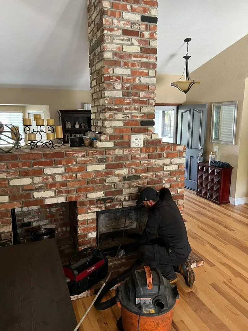 Sweeping a floor-to-ceiling brick chimney breast