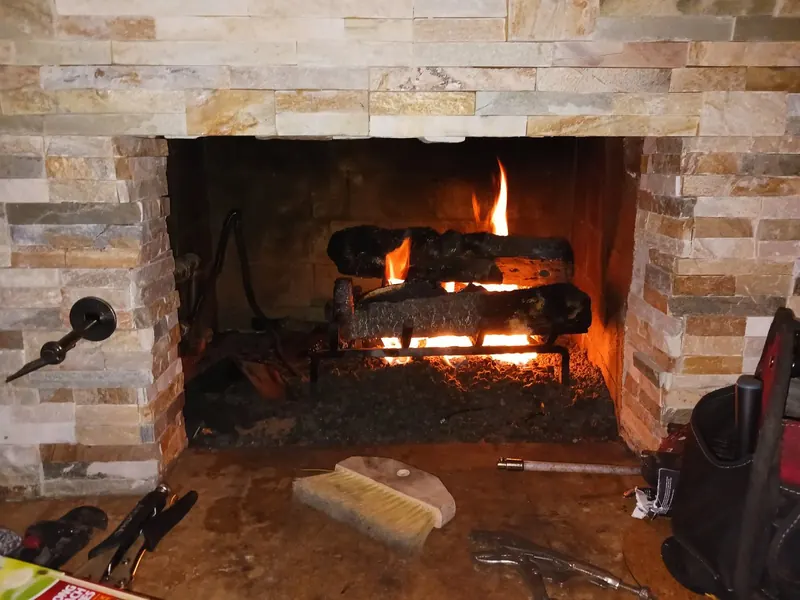 Stone fireplace cleaned and finished after service